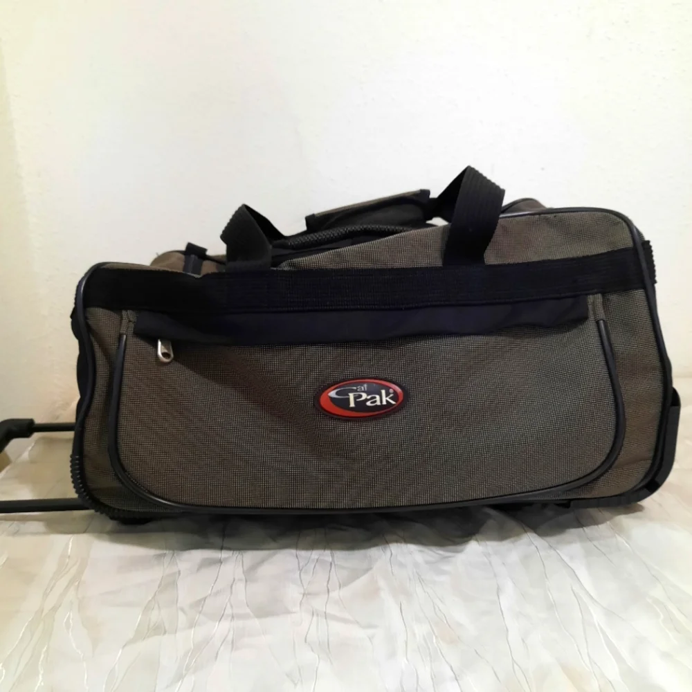 Calpak rolling duffel bag